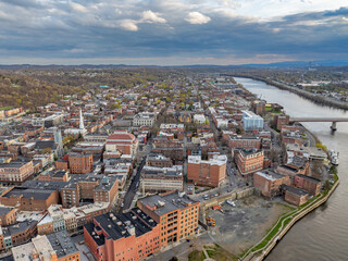 Late afternoon spring aerial view of downtown Troy, NY located on the Hudson River.