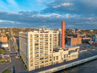 Late afternoon spring aerial view of downtown Troy, NY located on the Hudson River.