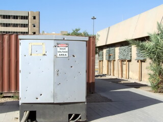 Blast damage to a electrical box at FOB Loyalty during Operation Iraqi Freedom in Baghdad, Iraq