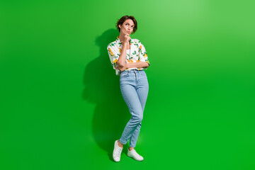 Full body photo of young attractive model touch chin thoughtful looking interested empty space...