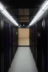 A room with server cabinets. Data processing center