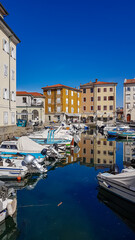 Scenic view of Trieste channel Canal Grande in Friuli-Venezia Giulia, Italy, Europe. Boats floating...