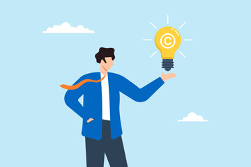 Businessman holding light bulb idea with copyright symbol illustrating protecting intellectual property. Concept of reserving copyright, trademarking original idea or innovation, and legal protection