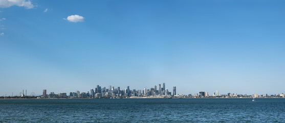 Panorama of the Melbourne city CBD skyline seen from across Port Phillip Bay, Melbourne, Australia