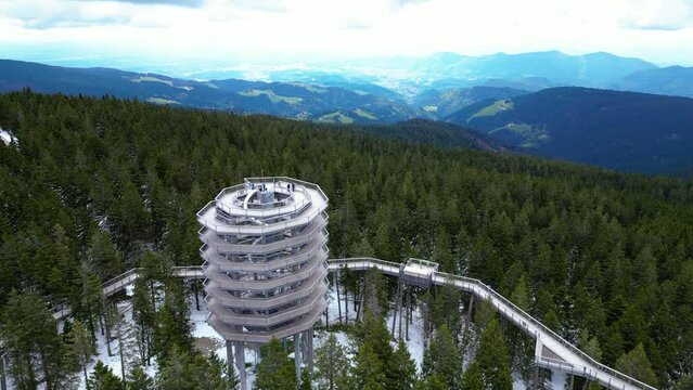 The "Pot med kro&scaron;njami" observation point on the Pohorje ridge offers breathtaking views of the surrounding forests and mountains of Slovenia