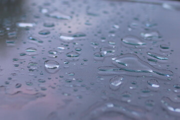 Water drops on glass after rain