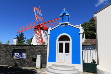 Fototapeta na wymiar Pico Vermelho windmill on the coast of Sao Miguel Island, Azores