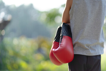 A young woman is exercising and boxing, Thai boxing