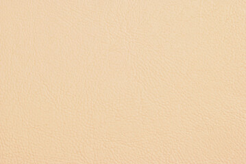 Beige smooth pebbled leather texture pattern as background