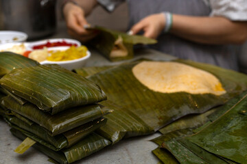 wrap a Hallaca or tamale in banana leaf.