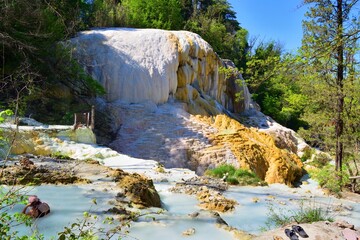 Naklejka premium view of the sulphurous water spa Bagni San Filippo characterized by the presence of limestone deposits in Siena, Tuscany, Italy