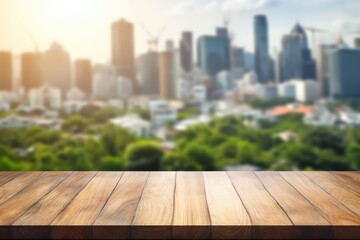 The empty wooden table top with blur background of downtown business district. Exuberant image....