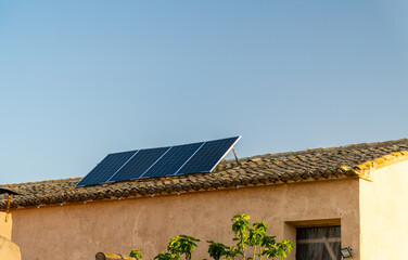 Solar panels in the roof of a country house. 