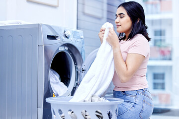 Laundry machine, smell and woman in home for cleaning, hygiene and housework in the morning....