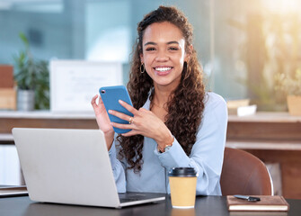 Black woman, portrait and typing on laptop and phone in office, smile and networking on app. Female...