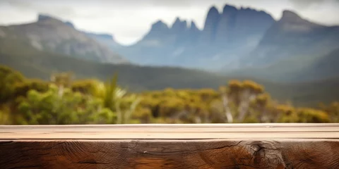 Foto op Plexiglas Cradle Mountain The empty wooden brown table top with blur background of Cradle mountain in Tasmania. Exuberant image. generative AI