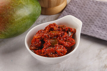 Spicy pickled raw green mango