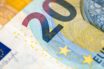 Macro detail of 20 euro bill on a table for backgrounds, textures and concepts of European and...