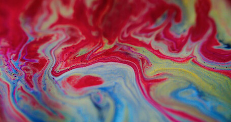 Glitter fluid wave. Paint flow. Liquid marble texture. Blur magenta pink blue white color mix...