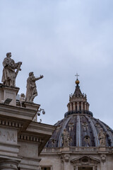Fototapeta na wymiar St. Peter's Basilica Roof Statues Close Up in Rome, Italy