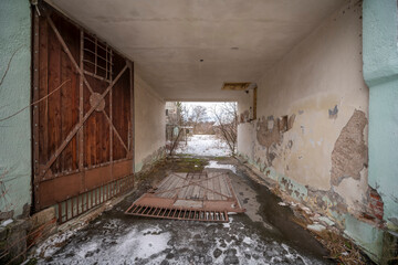 Exploration the historic old stone mill with a spiral staircase in Southern Poland, Europe, in...