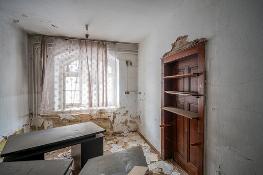 Exploration the historic old stone mill with a spiral staircase in Southern Poland, Europe, in Winter