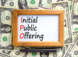 IPO initial public offering symbol. Concept words IPO initial public offering on beautiful wooden...
