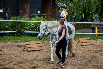 June 21 2020 Minsk Belarus A young teenage girl rides a horse