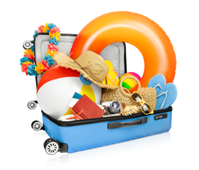 suitcase with various accessories for travel and beach holiday on white isolated background