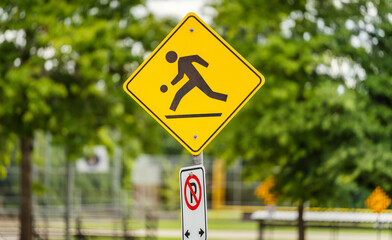 Slow down. Kids are playing, warning traffic sign in Vancouver