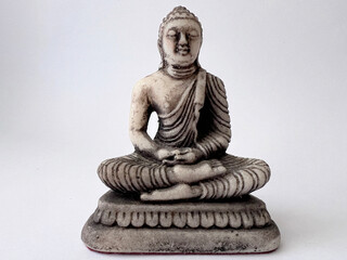 Meditative Buddha Statue in Isolated Serenity