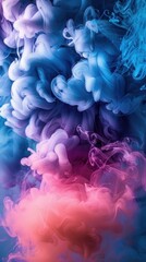 Obraz premium Abstract thick clouds of colorful multi-colored smoke, chaotically intertwining with each other on blue background
