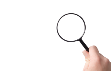 lens, black magnifying glass in hand in hand on a isolated background close-up