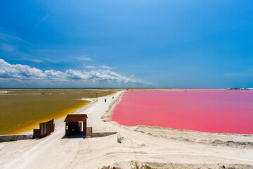 Huge salt evaporation ponds for sea salt extraction lie on this stretch of land, some of them...