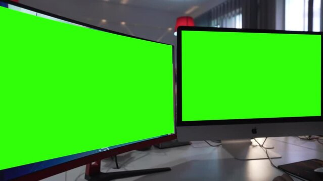 close up shot of multiple devices with green screen