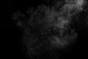 Obraz premium White texture on black background. Dark textured pattern. Abstract dust overlay. Light powder explosion. 