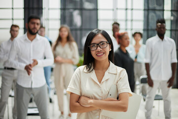 Business colleagues in conference meeting room during presentation