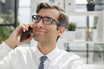 Man accountant or business lawyer talking on smartphone