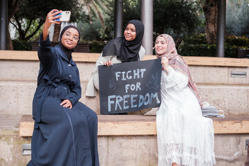 Group of Arab women demanding peace in conflict zones. Concept: stop war, peace
