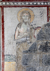 San Giovanni Battista; affresco nella chiesa romanica di San Fedele a Como - obrazy, fototapety, plakaty