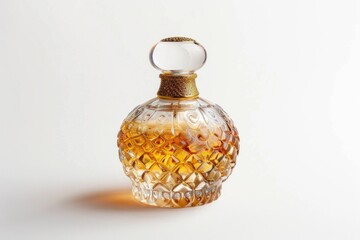 A clear glass bottle with a shiny gold top, suitable for various design projects