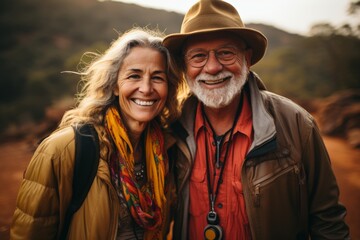 Happy senior couple enjoying a hike in nature