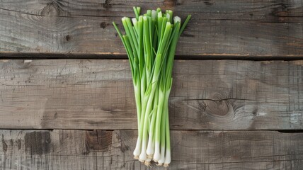 Sweet Garleek against a rustic wooden background, emphasizing its natural state and hybrid features