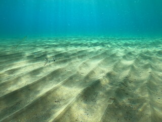 underwater blue ocean wbackground with sandy sea bottom in corfu island,Greece