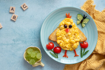 Scrambled egg chick for kids Easter's breakfast - obrazy, fototapety, plakaty