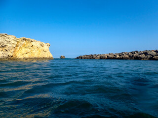 Fototapeta na wymiar Costa rocciosa di Punta Cirica 1077