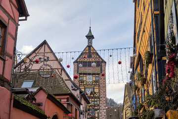 Riquewihr, France: Picturesque street with traditional half timbered houses on the Alsace Wine Route.