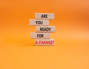 Change symbol. Wooden blocks with words Are you ready for a new change. Beautiful orange...