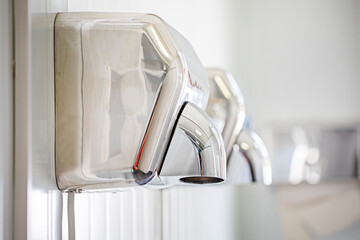 modern hand dryer in the toilet room. Modern Design Trends