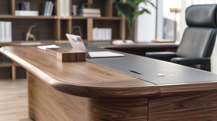 a wooden desk with a laptop on it in a room with a bookcase and a chair in the background